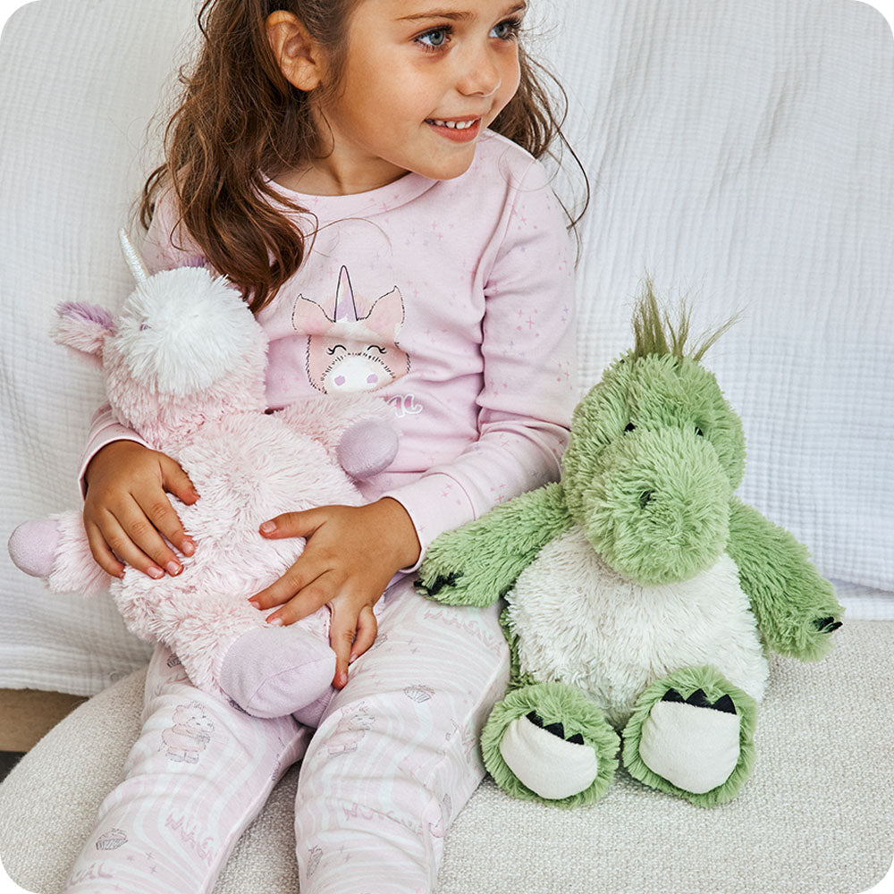 Image 102: green dinosaur warmies stuffed animal on couch
